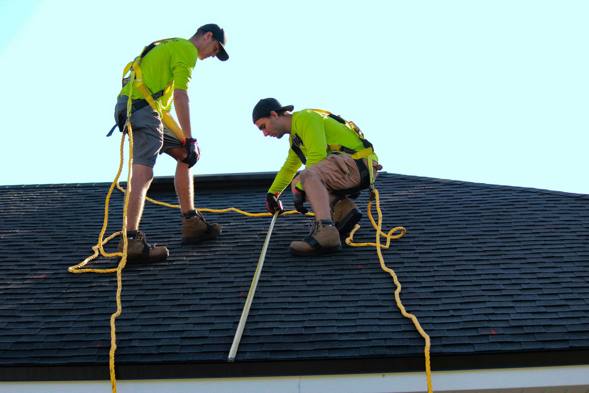 a couple of people that are on a roofing contractor San Antonio TX